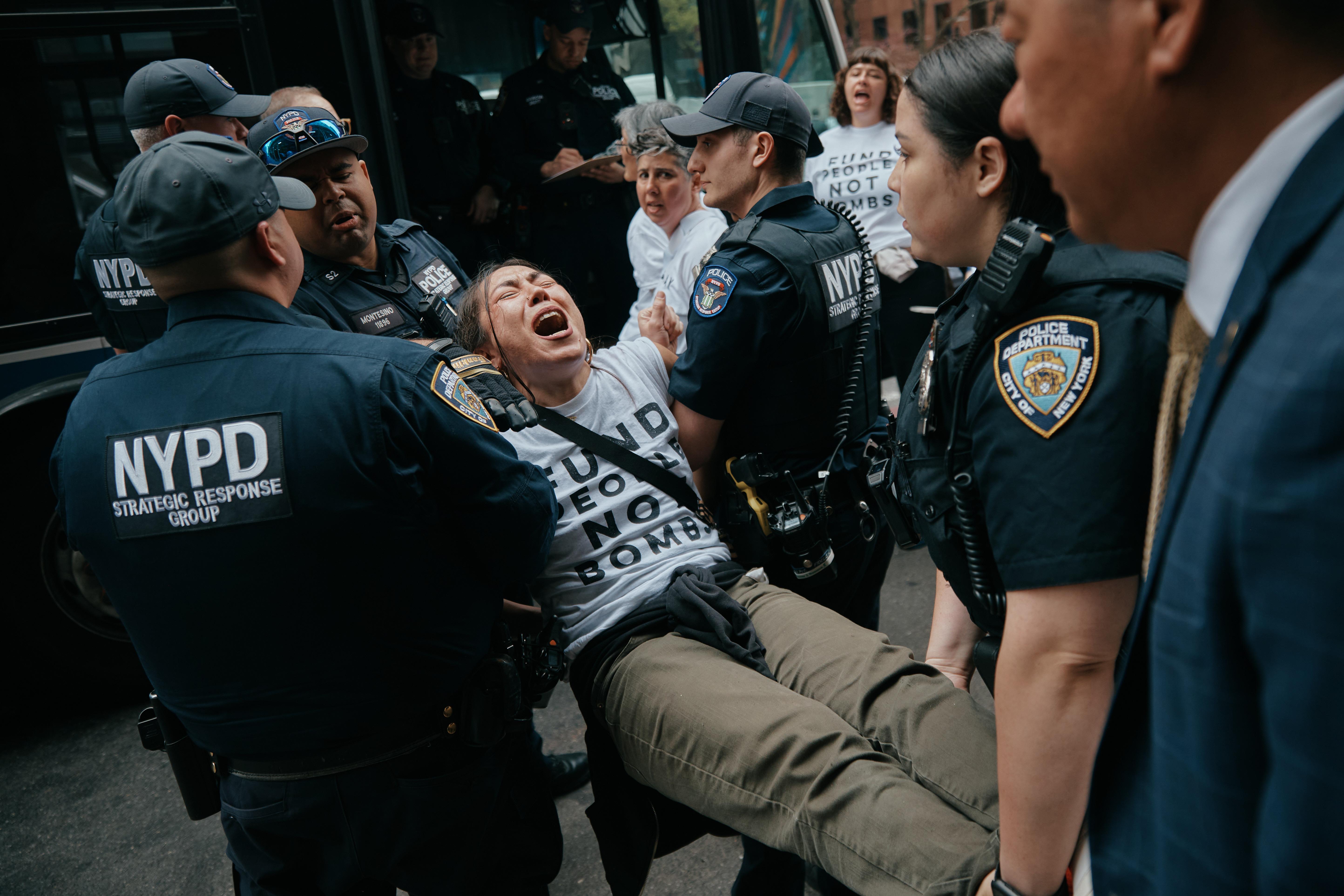 Protesters with Jewish Voice for Peace get arrested after blocking...