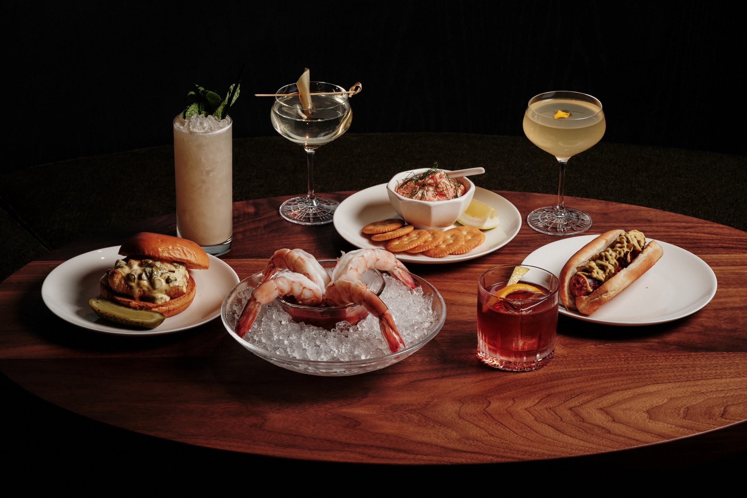 Bar 109 tablescape with drinks, food, and more