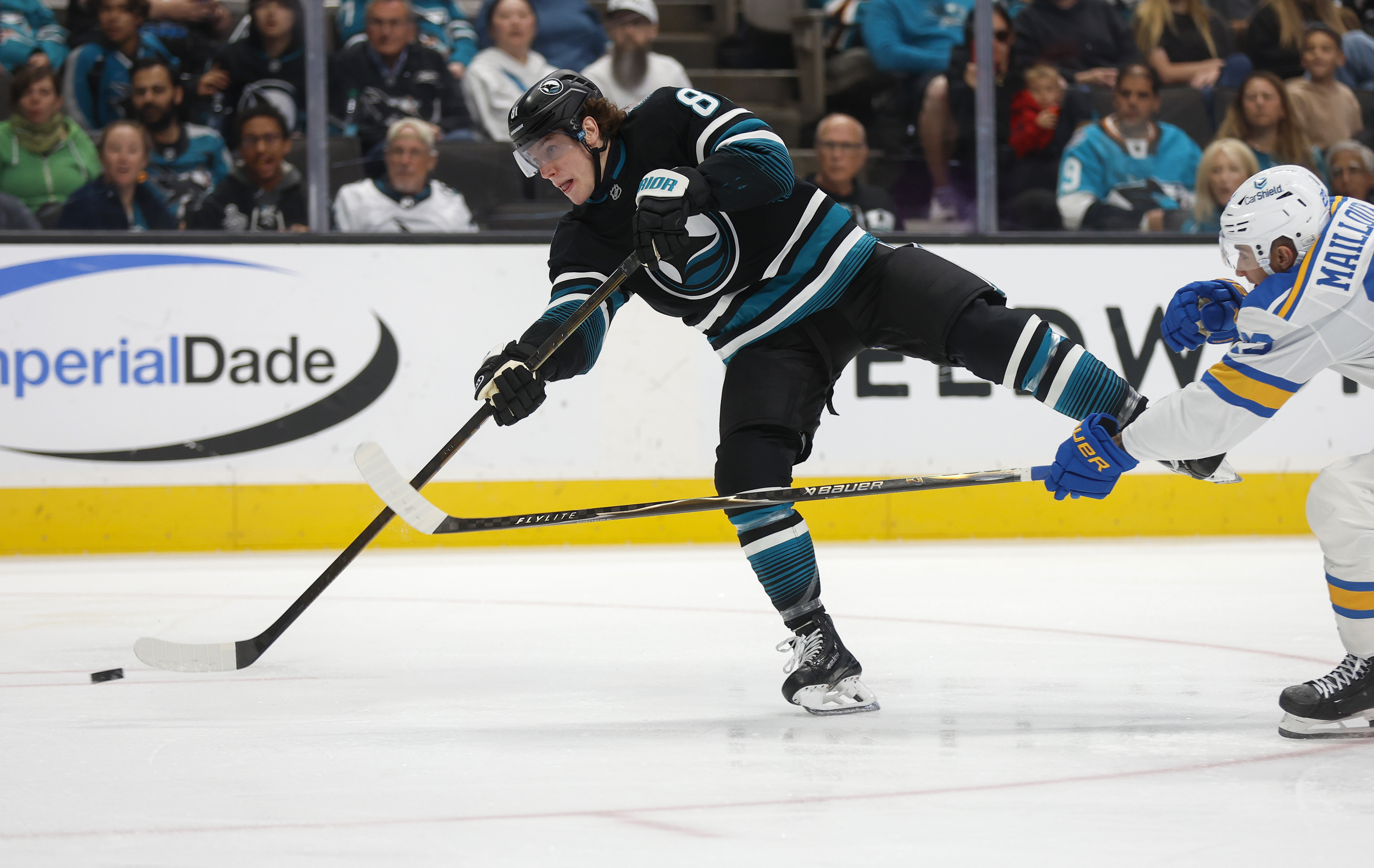 San Jose Sharks' Adam Gaudette (81) takes a shot against...