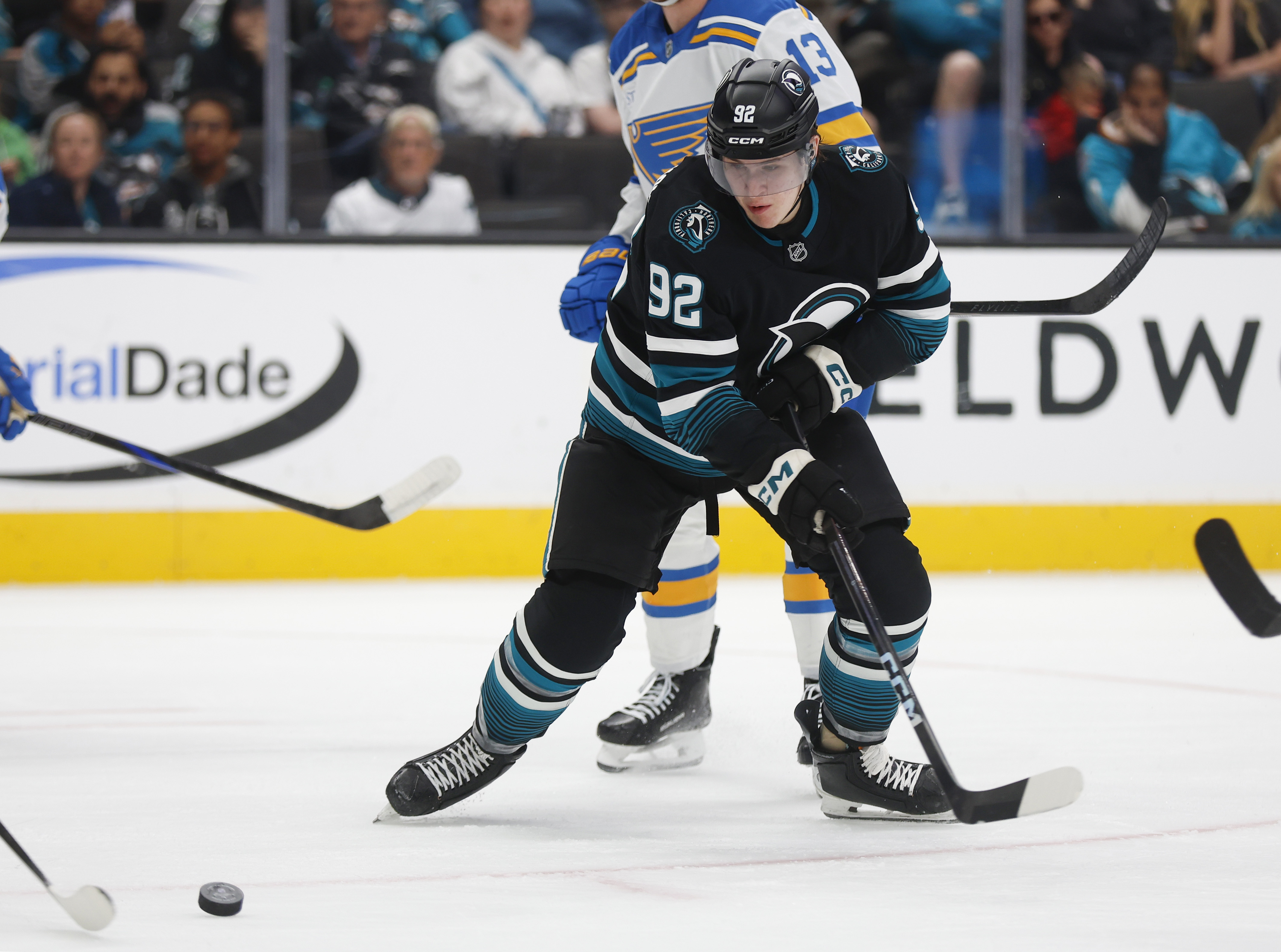 San Jose Sharks' Igor Chernyshov (92) fights for the puck...