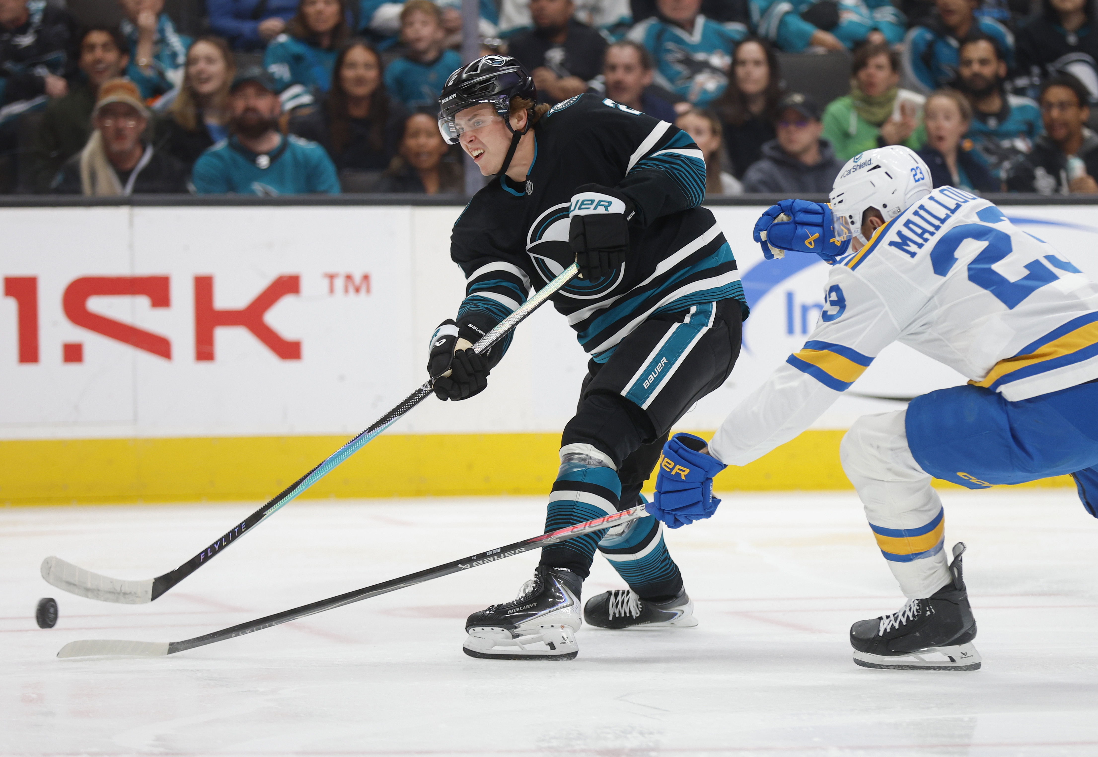 San Jose Sharks' Will Smith (2) takes a shot against...
