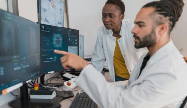 Researchers examine radiological imaging at a computer