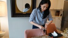 Sophia Bassan has endured post-mastectomy pain syndrome, or PMPS, which is estimated to affect thousands of U.S. women each year. With no clear treatment, Bassan and others have experimented with options such as the nerve stimulation machine pictured here.