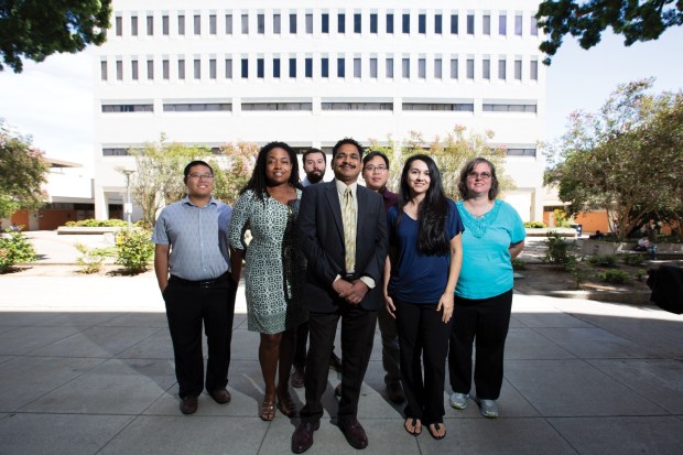 Civil and environmental engineering professor Sudarshan Kurwadkar, center, with his colleagues