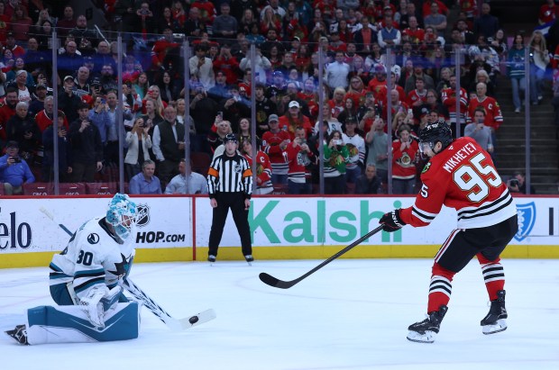 Chicago Blackhawks right wing Ilya Mikheyev (95) has his penalty shot blocked away by San Jose Sharks goaltender Yaroslav Askarov (30) in the first period of a game at the United Center in Chicago on April 15, 2026. (Chris Sweda/Chicago Tribune)