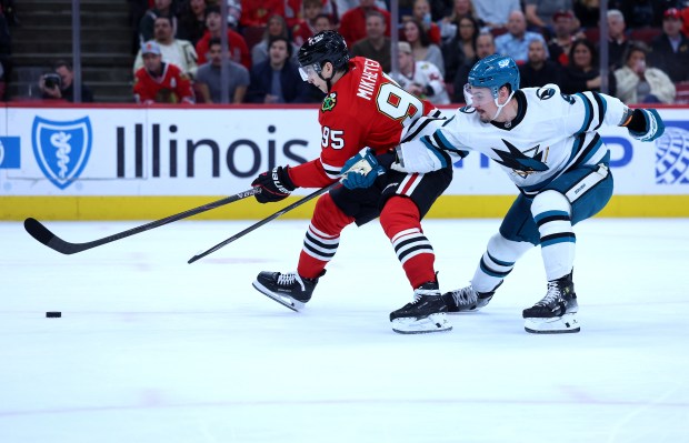 Chicago Blackhawks right wing Ilya Mikheyev (95) breaks away from San Jose Sharks defenseman Dmitry Orlov (9) before a penalty was called on Orlov in the first period of a game at the United Center in Chicago on April 15, 2026. (Chris Sweda/Chicago Tribune)