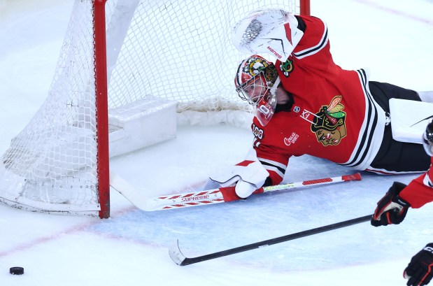 Chicago Blackhawks goaltender Spencer Knight (30) looks to make a save in the second period of a game against the San Jose Sharks at the United Center in Chicago on April 15, 2026. (Chris Sweda/Chicago Tribune)
