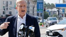 LOS ANGELES, CALIFORNIA - APRIL 09: Democratic gubernatorial candidate Tom Steyer speaks at a news conference outside a gas station showing gas prices above per gallon amid the war in Iran on April 9, 2026 in Los Angeles, California. Steyer held the press conference to discuss ``gas prices hitting record highs in California as a result of Trump's war in Iran." (Photo by Mario Tama/Getty Images)