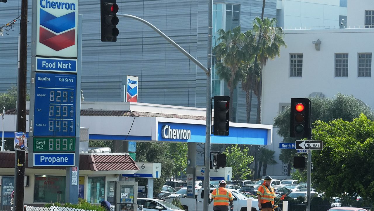 High gasoline prices are displayed at a filling station downtown Los Angeles Monday, March 30, 2026. (AP Photo/Damian Dovarganes)