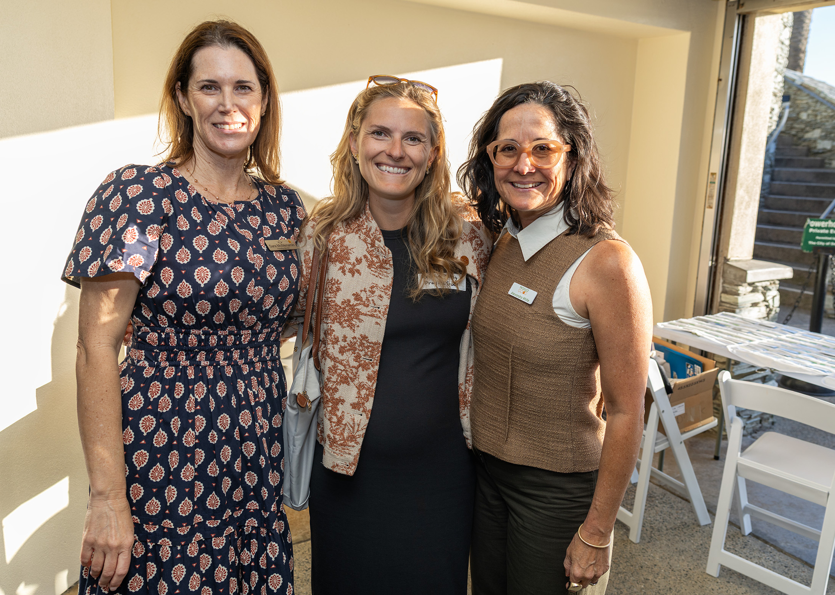 Sara McMenamin with representatives from Produce Good: Kristin King and...