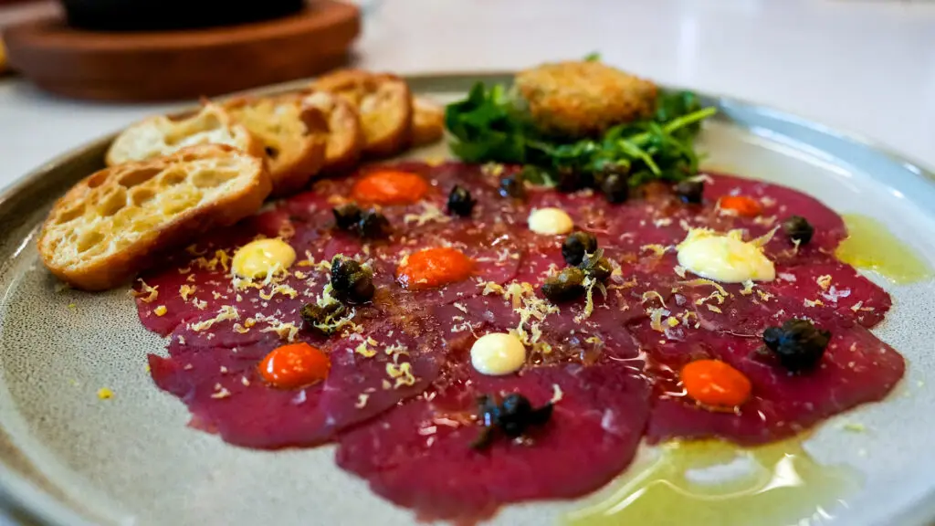 Carpaccio dish at Aiona. Photo by Denis Akbari.