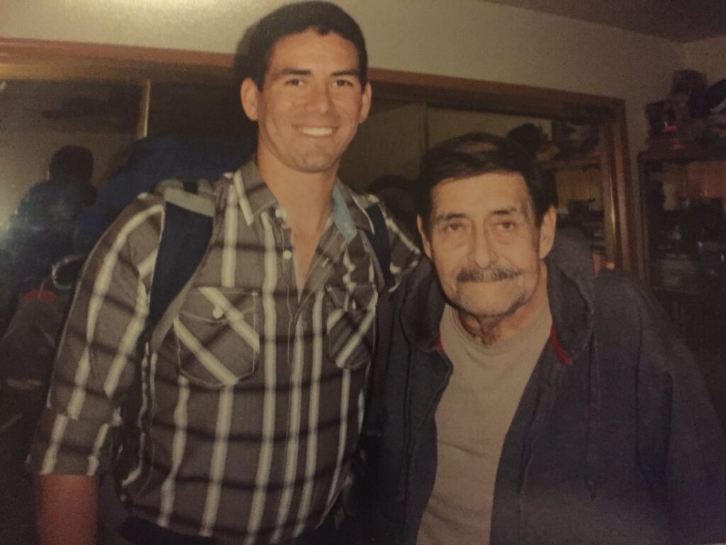 David J.X. Gonzalez standing next to his grandfather, Hector Xavier Gonzalez.