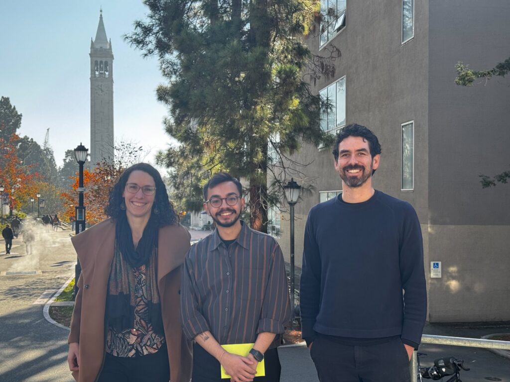 Lara Schwarz, Pratiyush Singh and David J.X. Gonzalez stand on the UC Berkeley campus with the Campanile in the background