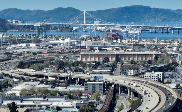 A drone view of The Port of Oakland and Bay Bridge from downtown Oakland, Calif., on Wednesday, March 11, 2026. (Jane Tyska/Bay Area News Group)