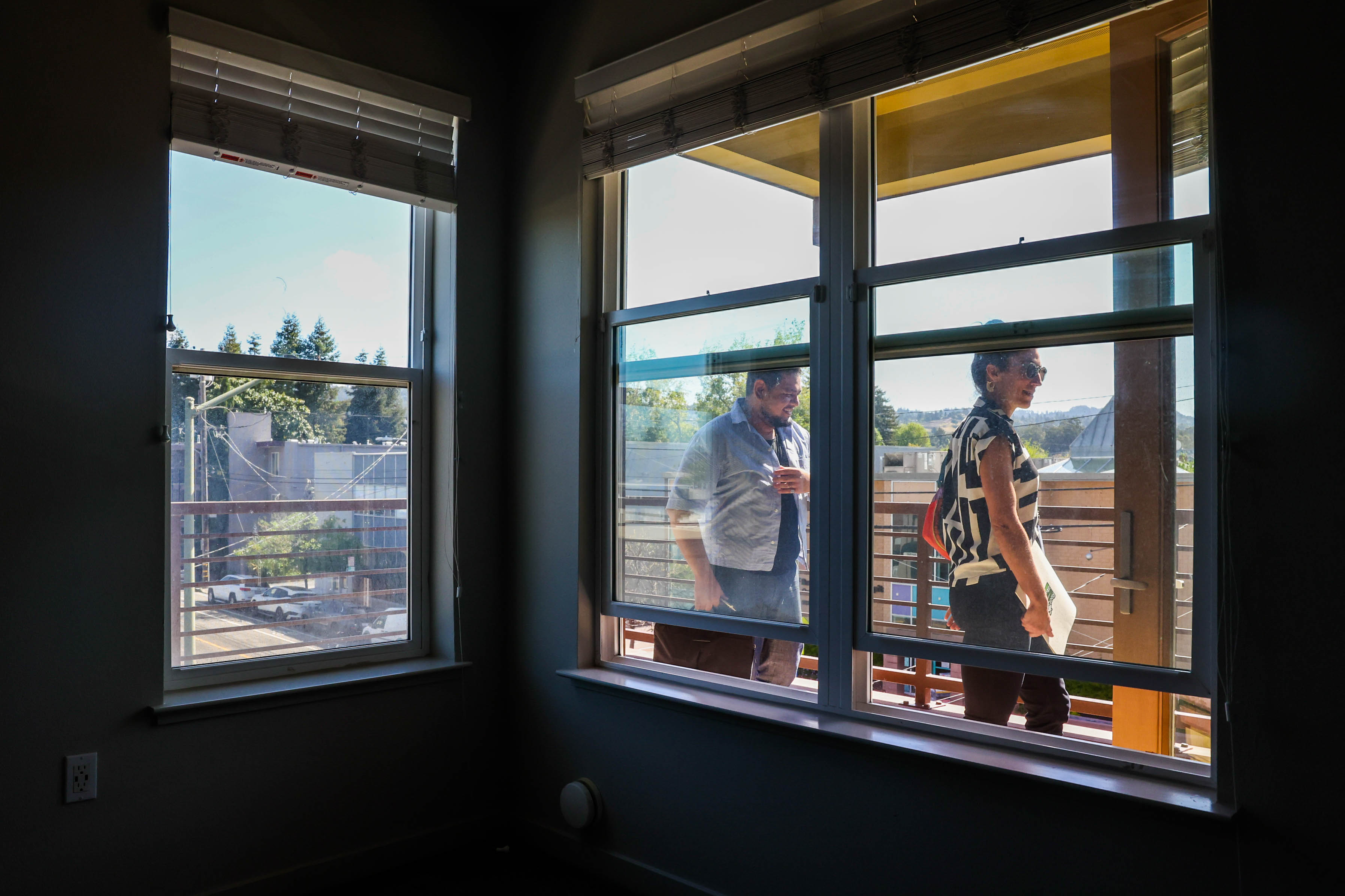 Guest tour one of the apartments after a ribbon-cutting ceremony...