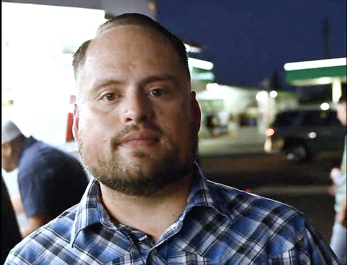 Armando Arias Jr. is interviewed outside his food truck Tacos El Cabezon, parked at Shaw and Maroa avenues Wednesday, Sept 24, 2025 in Fresno.
