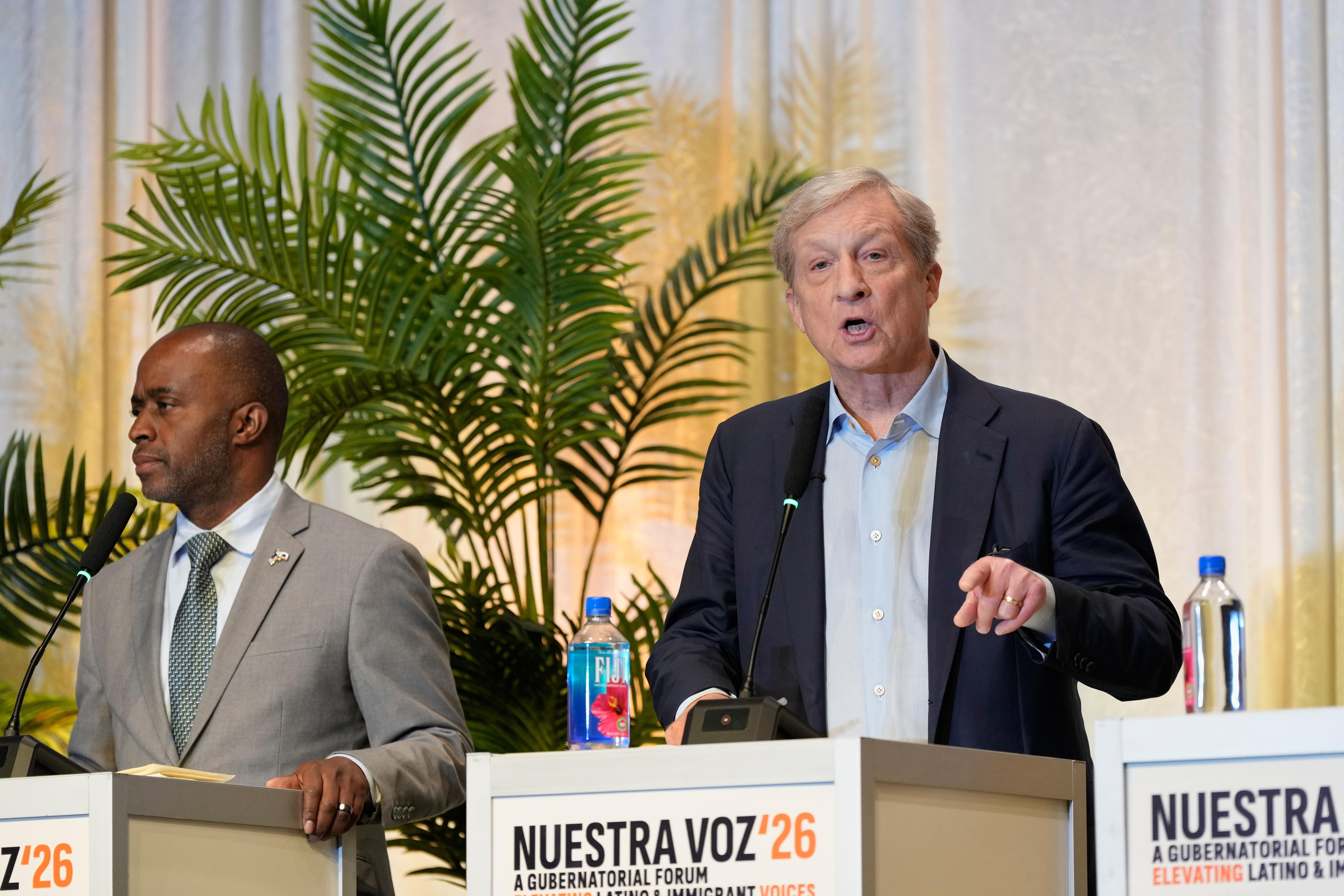 Tom Steyer, right, speaks beside Tony Thurmond during a gubernatorial...