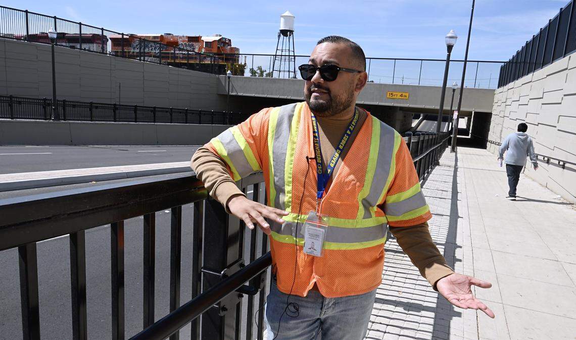 High Speed Rail public information officer Augie Blancas discusses the state of HSR as he stands at the Ventura Street Underpass and Grade Separation site during a tour of HSR work Wednesday, April 15, 2026 in Fresno.