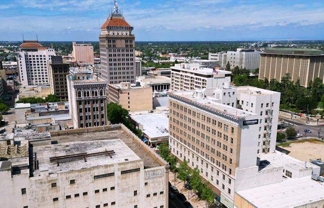 The historic T. W. Patterson building, center right, a landmark in downtown Fresno, has been listed for sale online at $8.1 million. Photographed Wednesday, April 1, 2026 in Fresno.