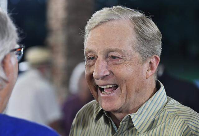 California gubernatorial candidate Tom Steyer laughs as he speaks to an audience member during an appearance Tuesday evening, April 7, 2026 in Fresno.