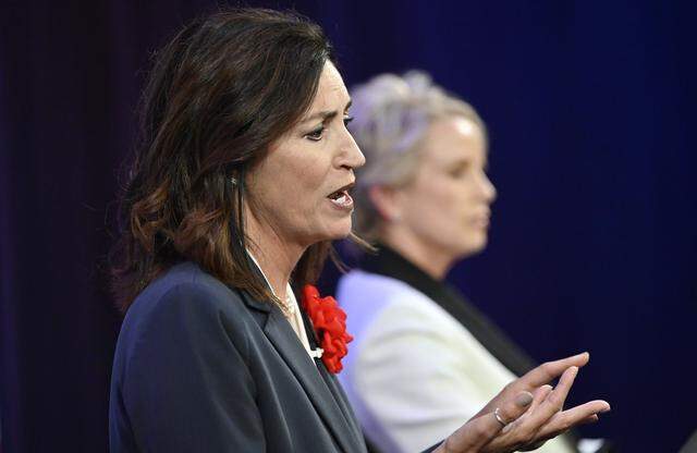 ichele Cantwell-Copher addresses a question, with Dr. Eimear O'Brien at background right, during the Fresno County Superintendent of Schools Candidate Forum Thursday night, April 2, 2026 in downtown Fresno.