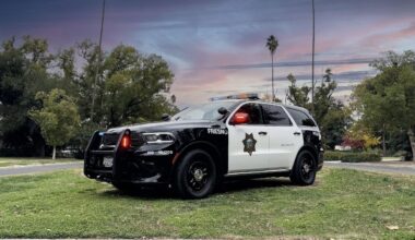 Fresno police arrested a 26-year-old man after finding a stolen Glock handgun equipped with an automatic conversion device during a probation search on Friday, April 17, 2026. (Fresno PD)