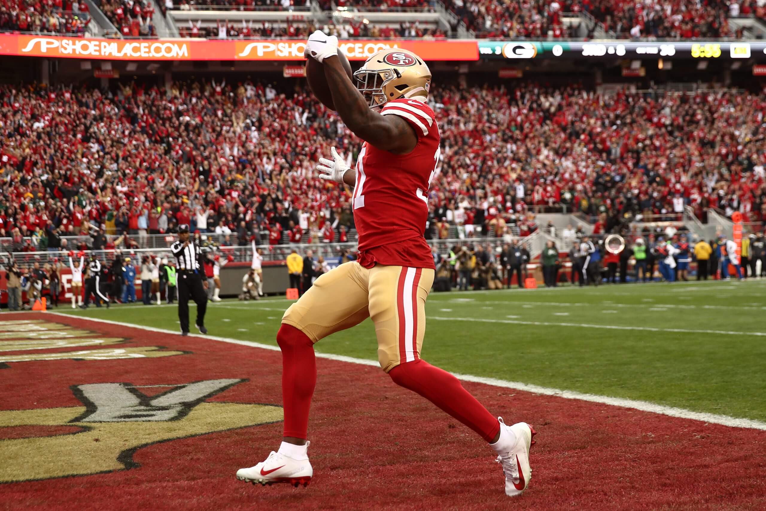 Raheem Mostert of the San Francisco 49ers scores a touchdown during the first quarter against the Green Bay Packers during the NFC Championship game at Levi's Stadium on January 19, 2020