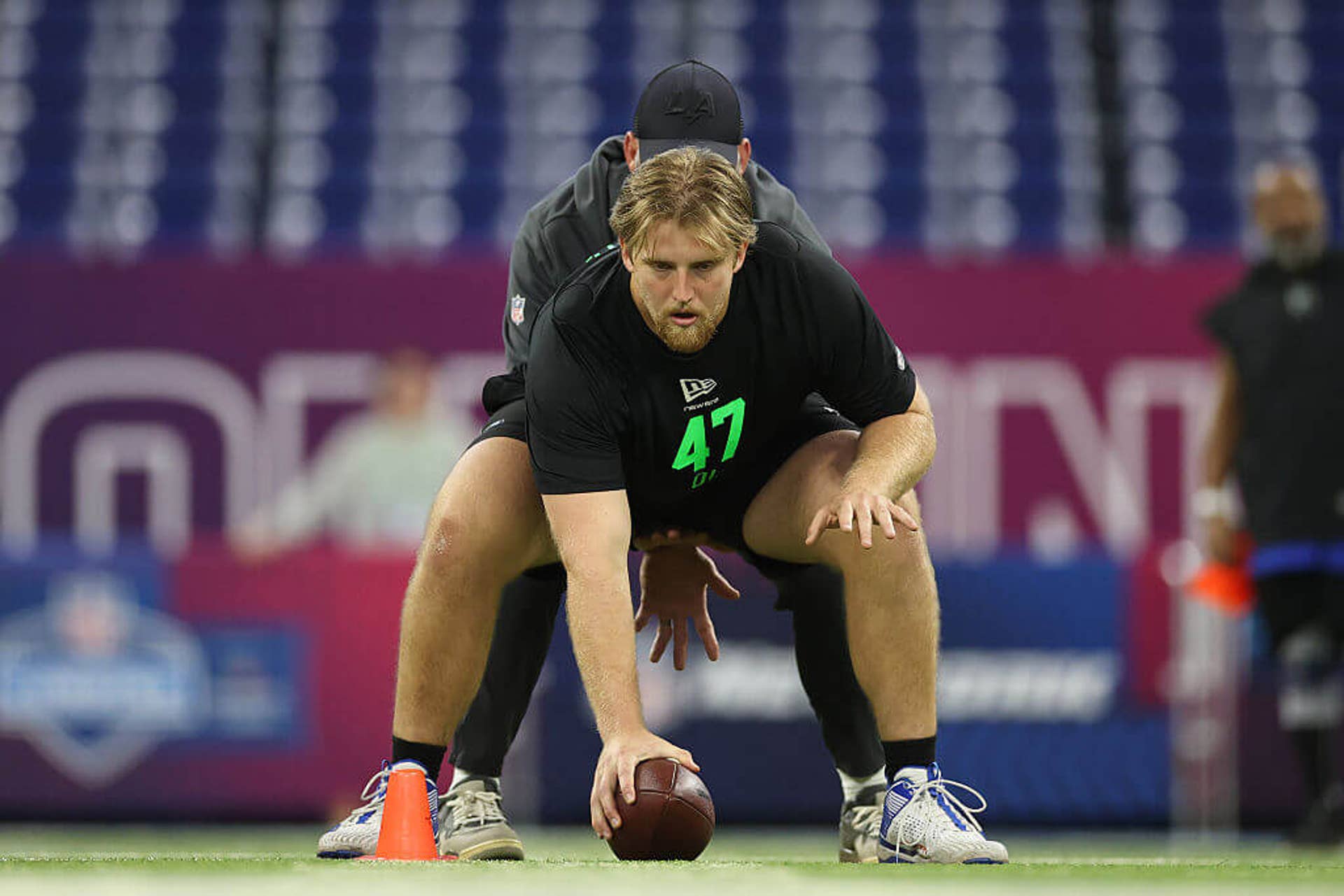 Jake Slaughter of the Florida Gators participates in a drill during the 2026 NFL Scouting Combine.