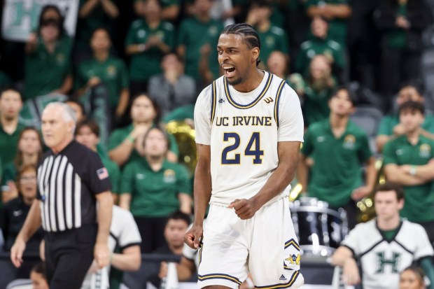 UC Irvine's Jurian Dixon reacts after failing to score during the first half of the Big West tournament final against Hawaii on March 14 in Henderson, Nev. (Photo by Ian Maule/Getty Images)