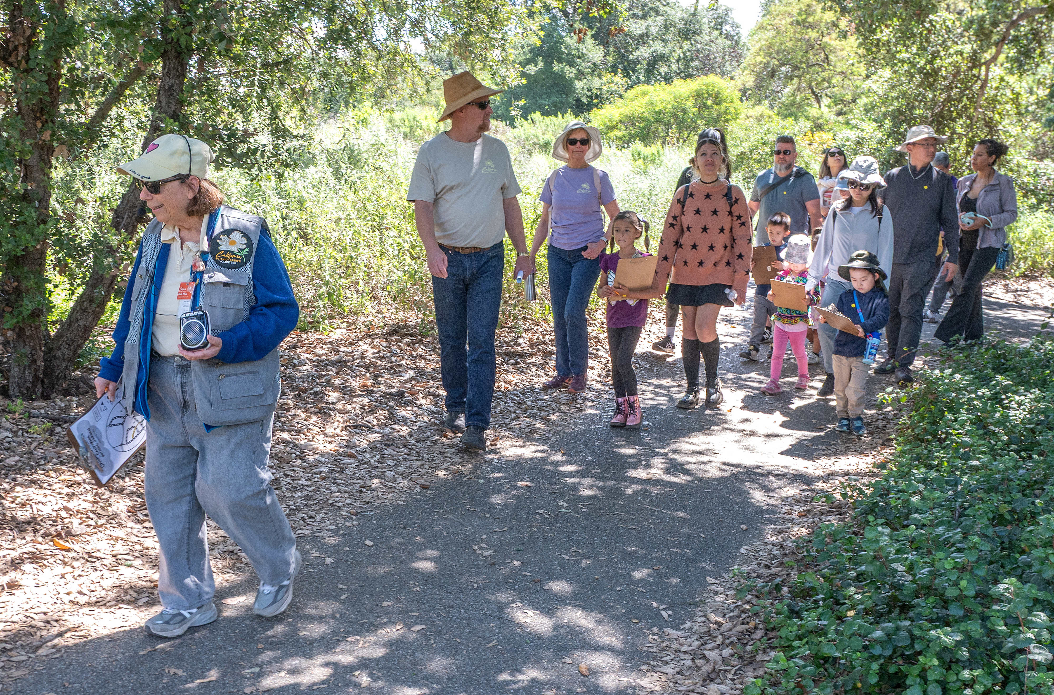 Tour guide Marla White leads a group on a nature...