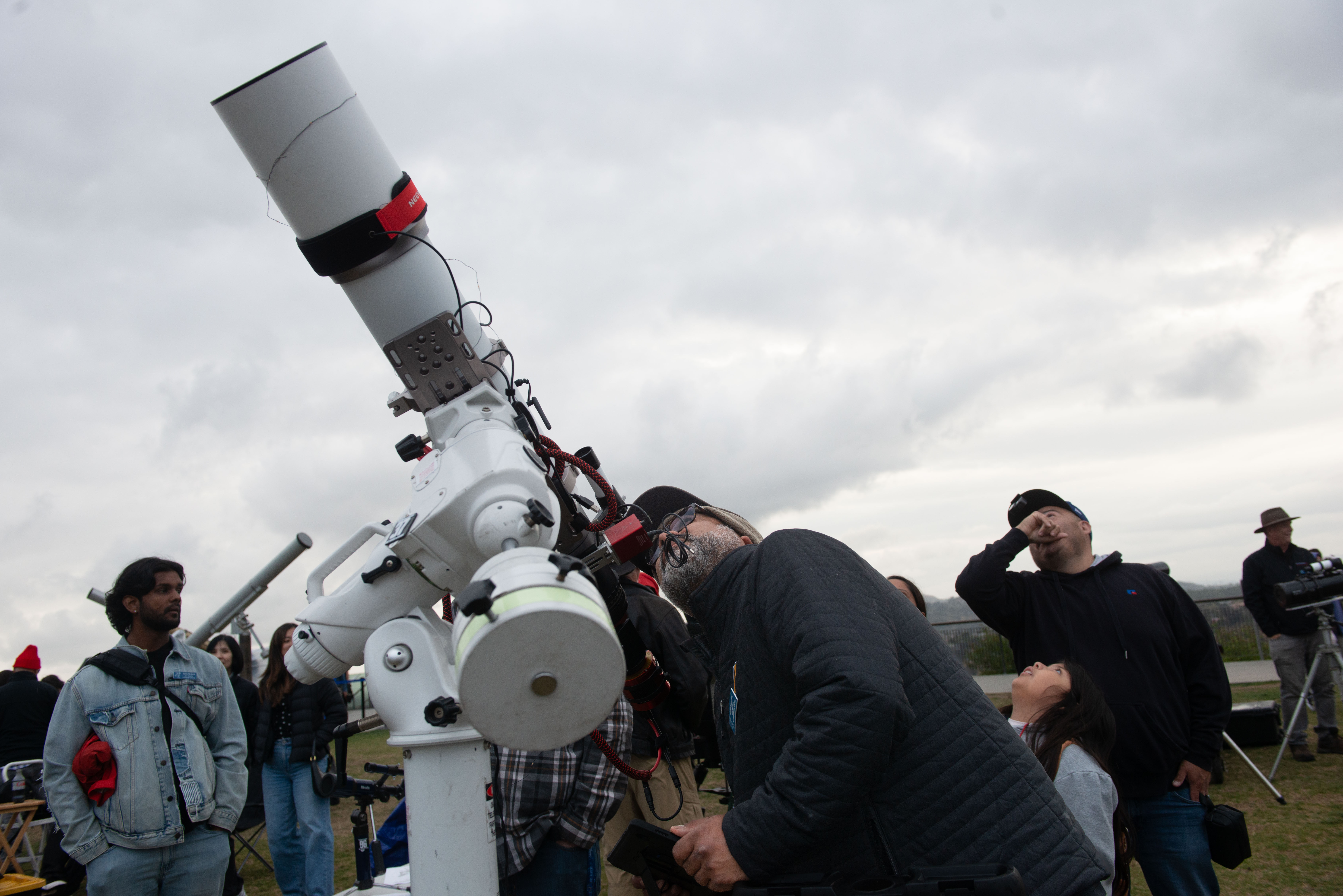 Rafael Gonzalez tries to line up a view of the...