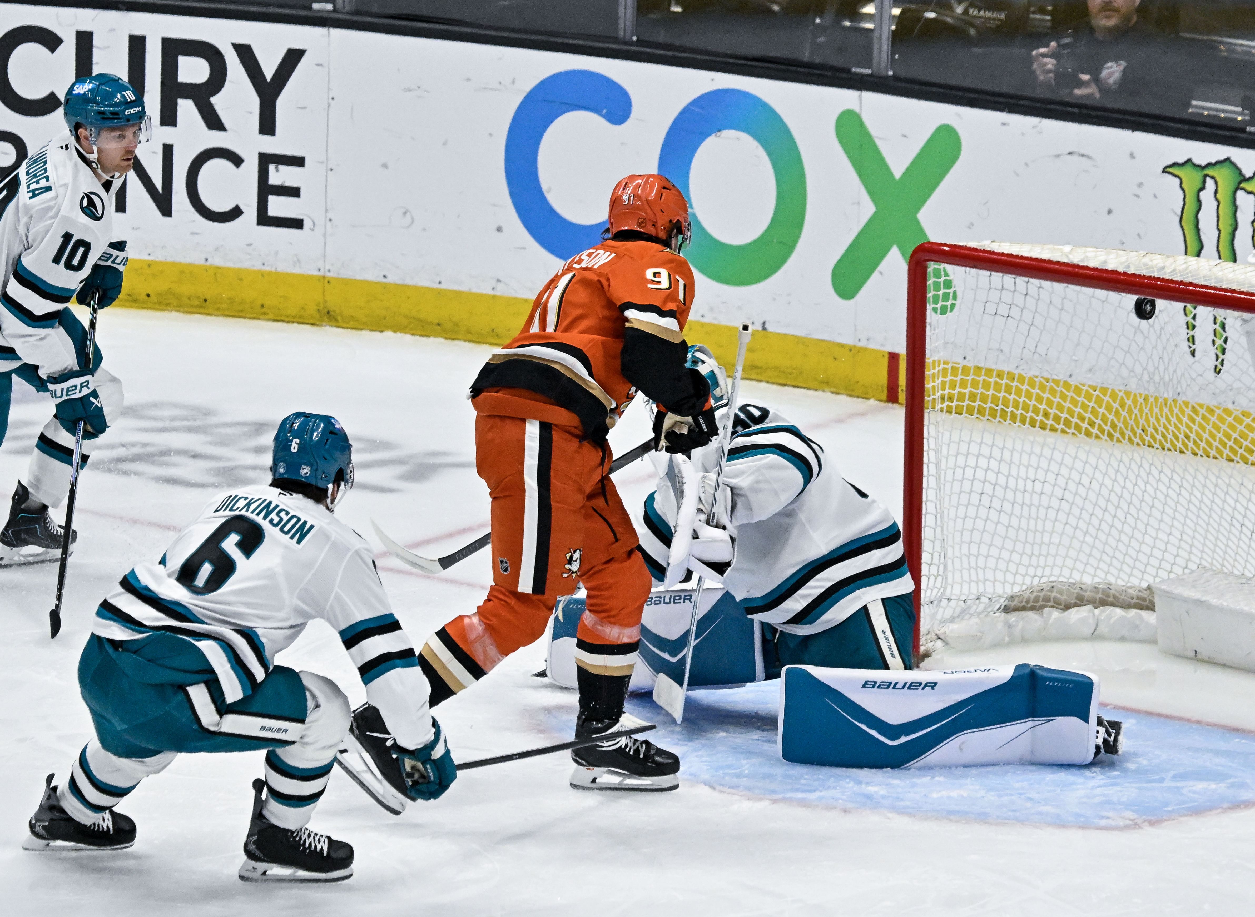 The Ducks’ Leo Carlsson (91) scores a goal past San...