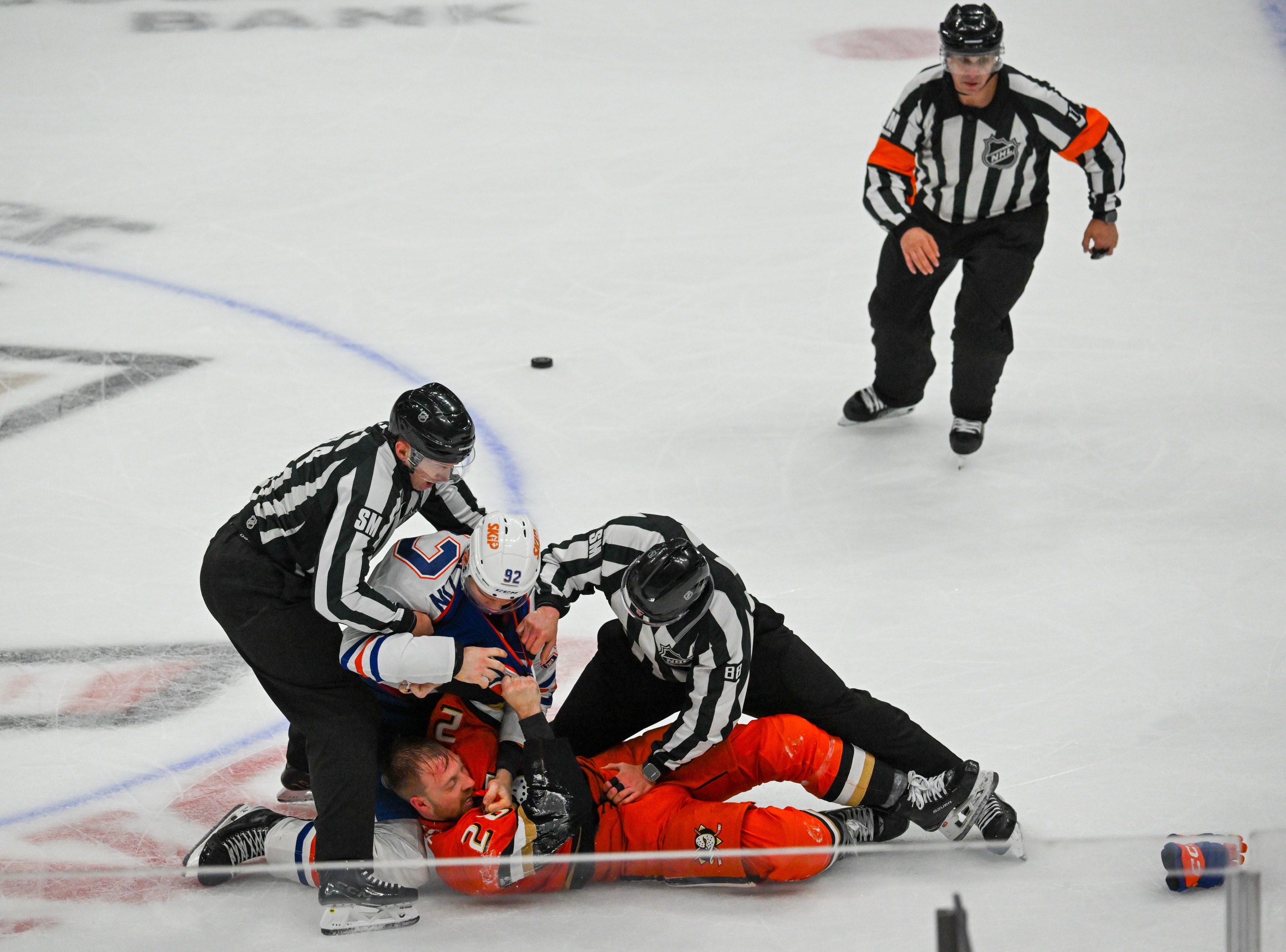 Edmonton Oilers Vasily Podkolzin (92) and Ducks Jeffrey Viel (28)...