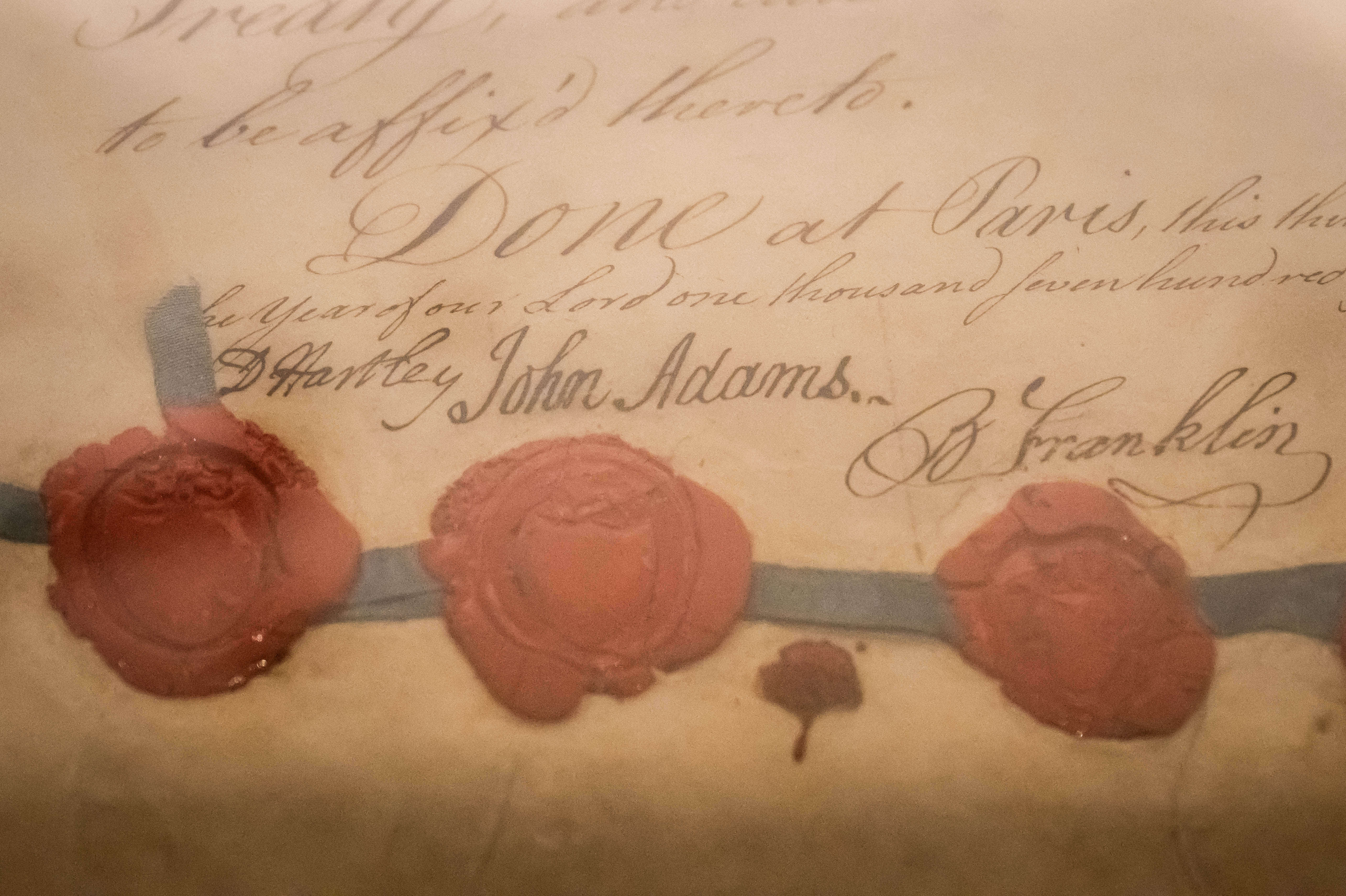The signatures of John Adams and Benjamin Franklin, on the...