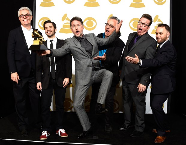 LOS ANGELES, CA - FEBRUARY 08: Musician Gordon Goodwin (C) and Gordon Goodwin's Big Phat Band, winners of Best Large Jazz Ensemble Album for 'Life in the Bubble,' pose in the press room during The 57th Annual GRAMMY Awards at the STAPLES Center on February 8, 2015 in Los Angeles, California. (Photo by Frazer Harrison/Getty Images)