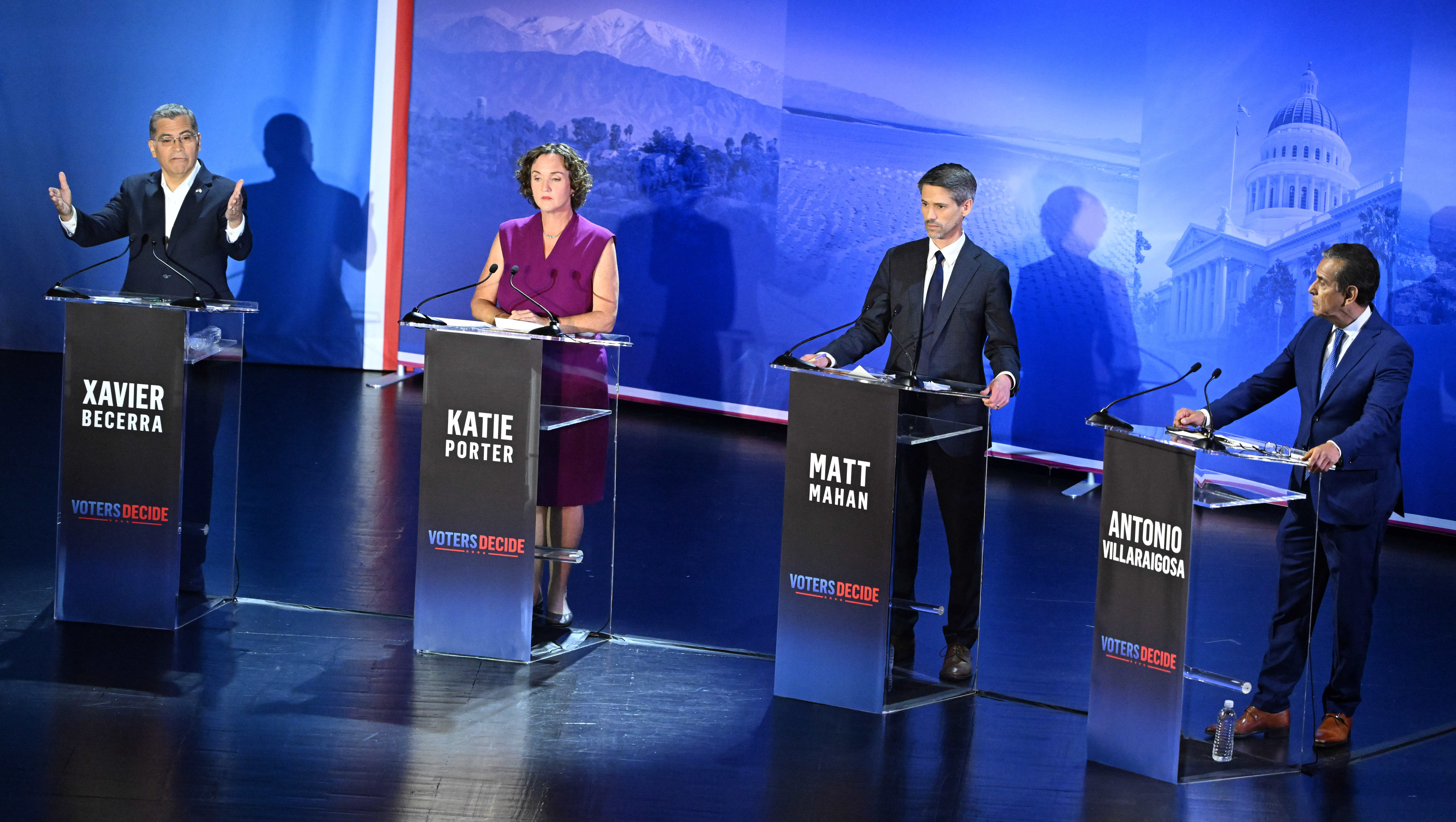 California gubernatorial candidate Xavier Becerra,left, speaks as Katie Porter, Matt...