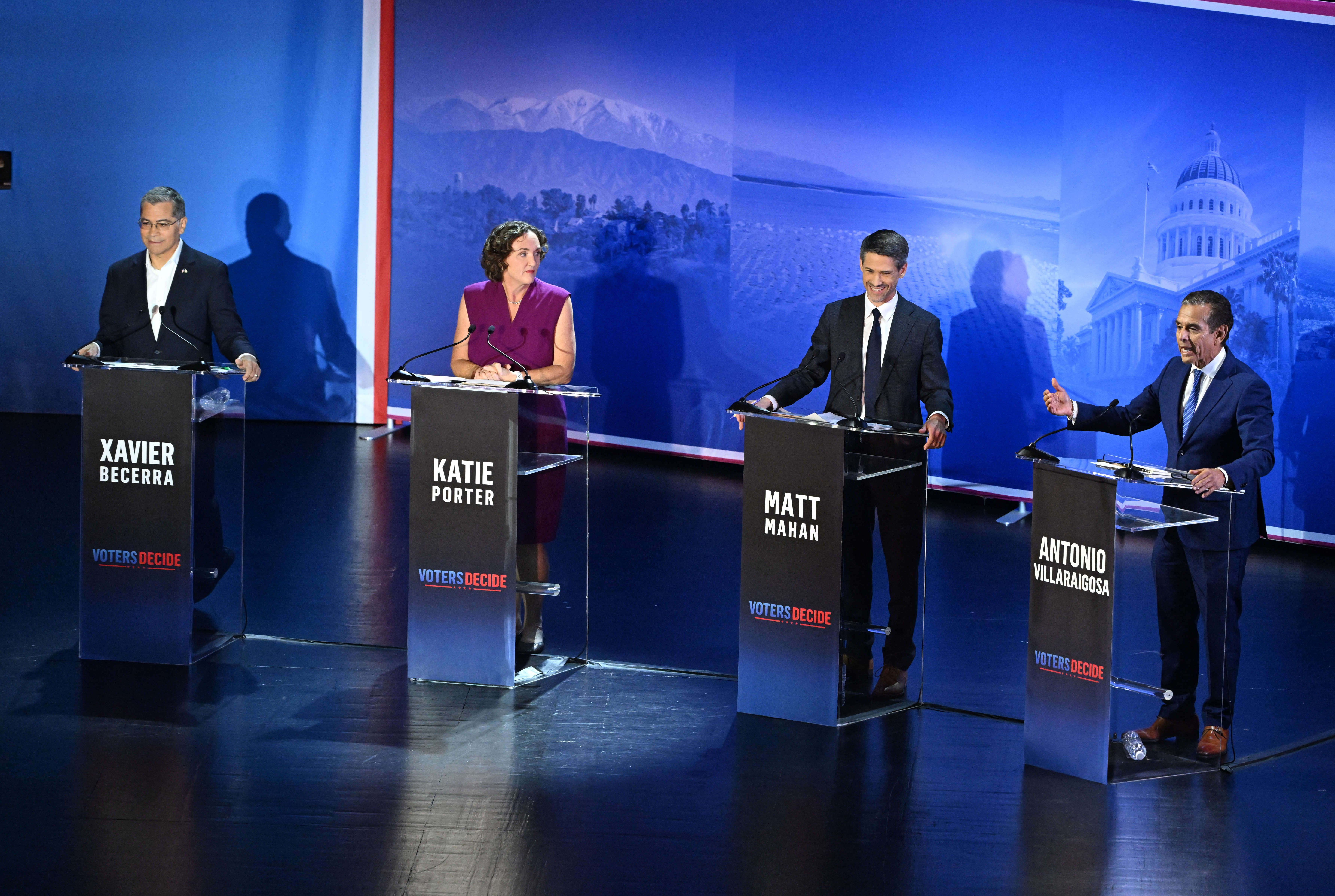 California gubernatorial candidate Antonio Villaraigosa, right, speaks as Xavier Becerra,...