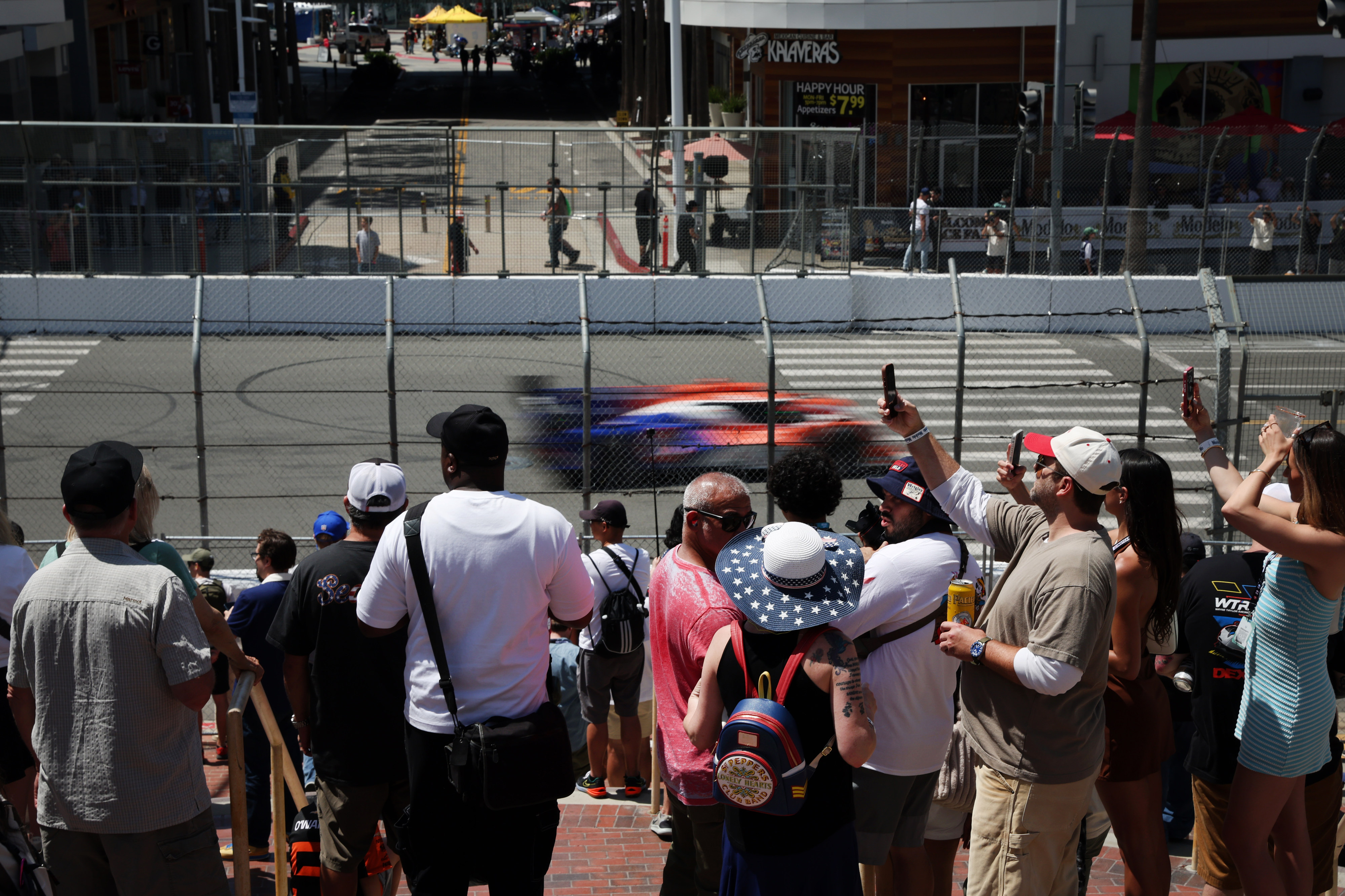 Motorsport fans watch the IMSA race during the 51st Grand...