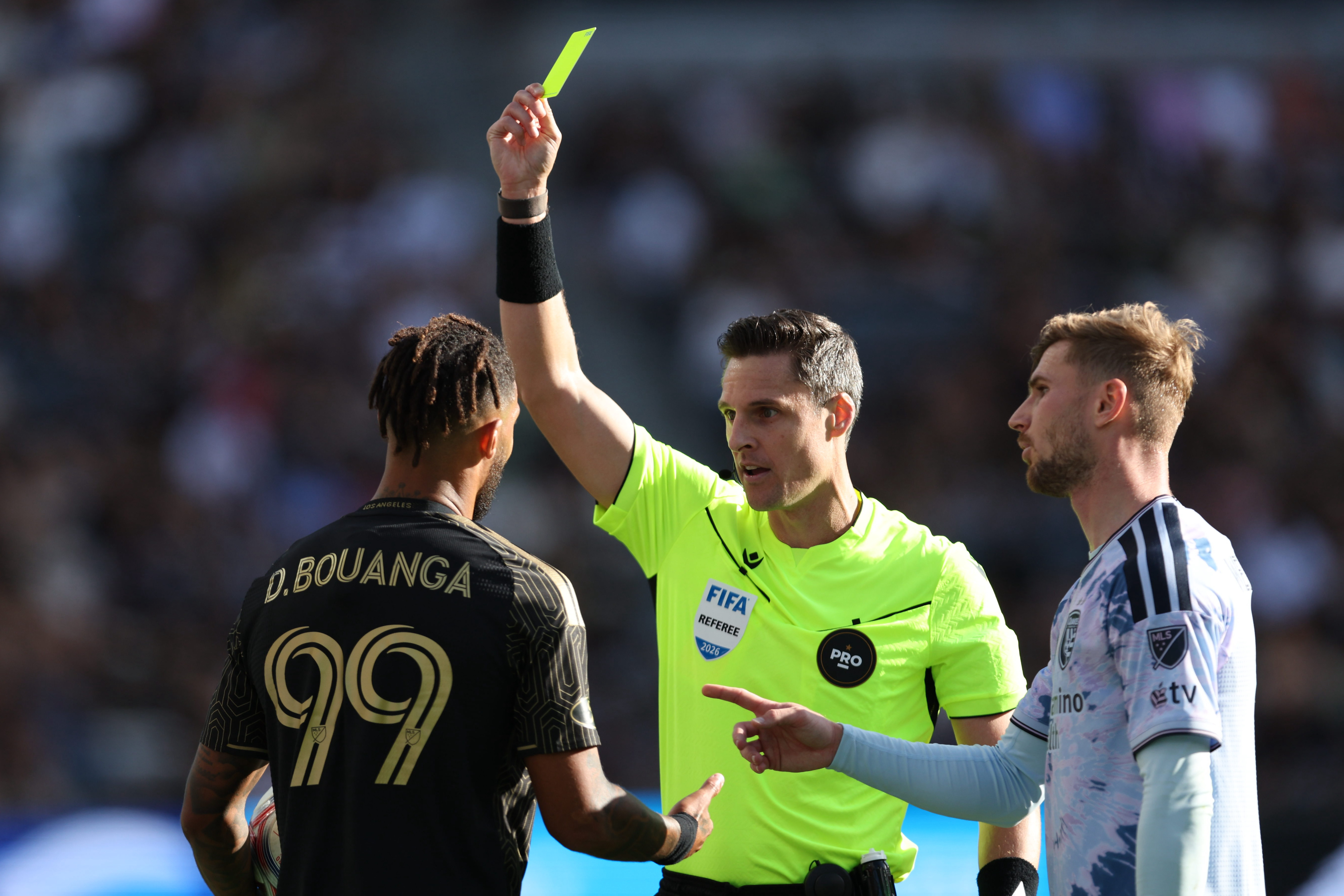 LAFC forward Denis Bouanga (99) recieves a yellow card during...