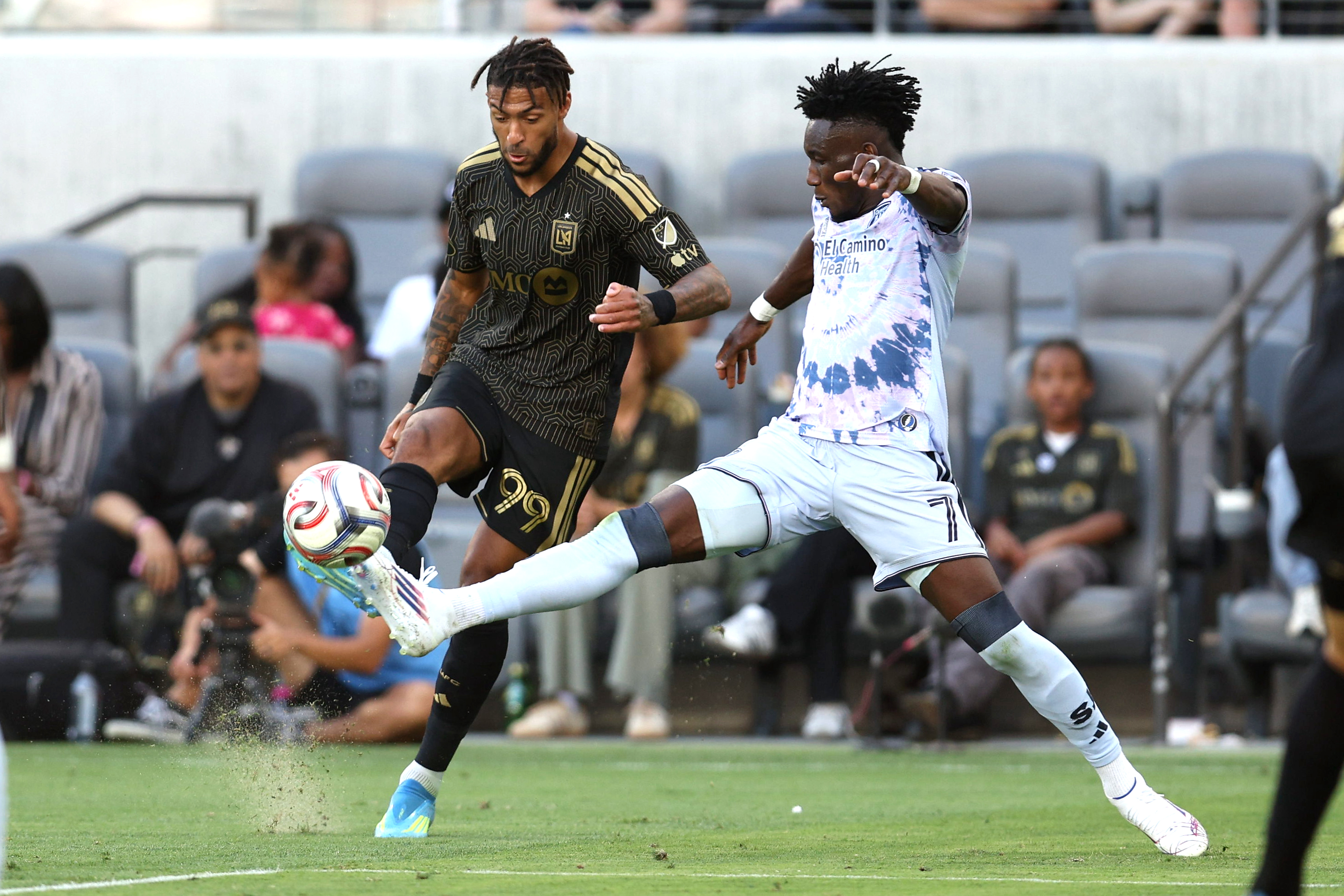 San Jose Earthquakes forward Ousseni Bouda (7) attempts to block...