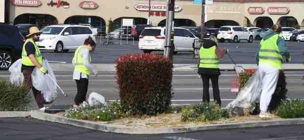 Volunteers cleaning trash near Reseda Boulevard and Nordhoff Street on Sunday, Jan 25, 2026 in Northridge. This is a community-based nonprofit 501c3 organization called "Volunteers Cleaning Communities" that is focused on "helping make the world around us a better, cleaner, environmental friendly, litter-free place. (Photo by Gene Blevins, Contributing Photographer)