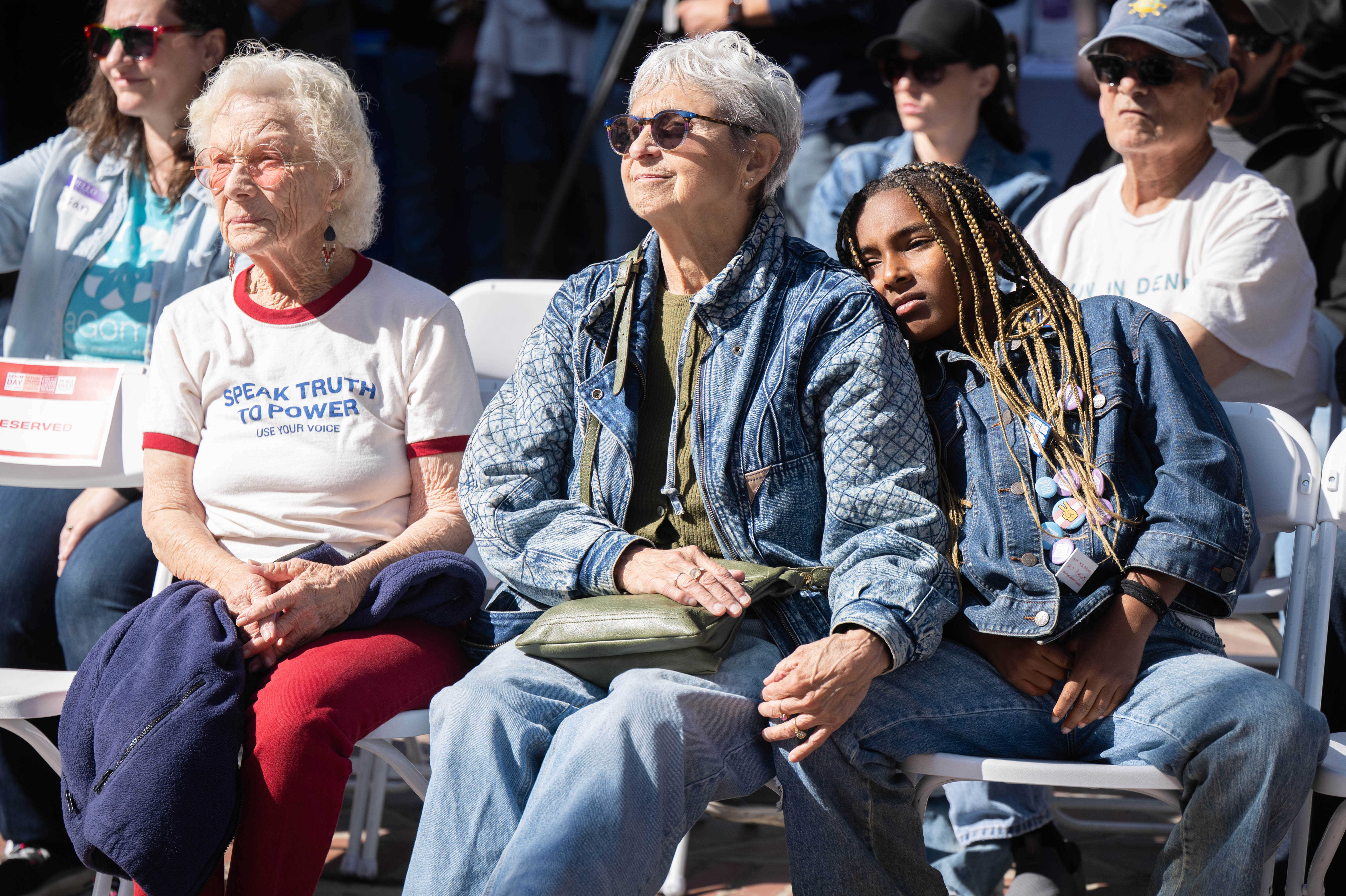 Rain Giggans-Ledley, 9, and her grandmother Ellen Ledly, center, wife...