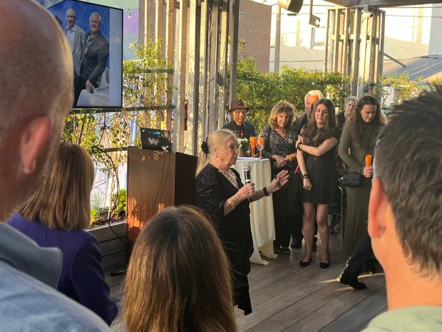 Marisa Ugarte, executive director of the Bilateral Safety Corridor Coalition, speaks about the group's efforts to fight human trafficking at last year's "Be the Light" event, which returns Thursday, April 23, at The Lot in La Jolla. (Noah Lyons)