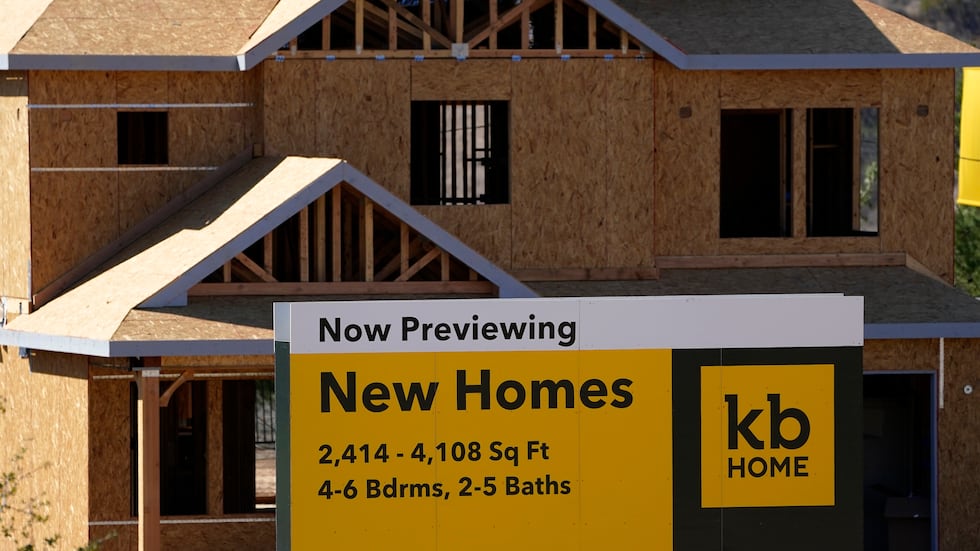 A sign sits in front of a KB Home construction site, Tuesday, Feb. 2, 2021, in Simi Valley,...