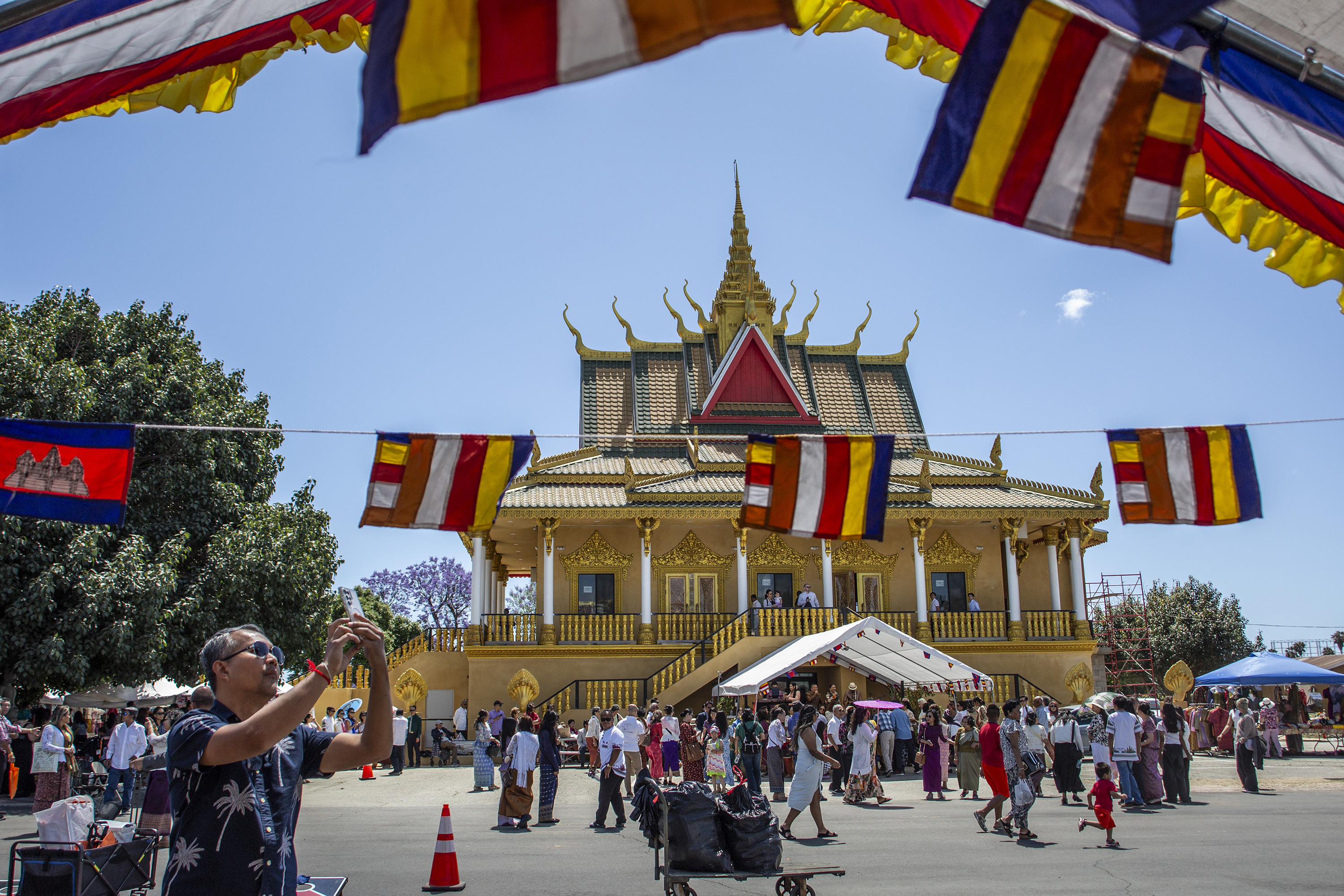 Attendees visit the new temple (still under construction) during the...