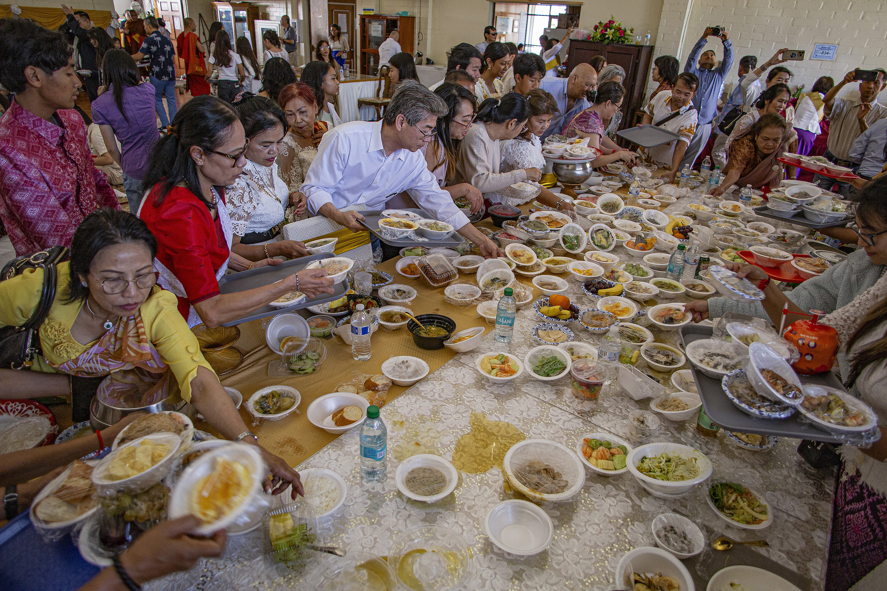 Food is shared with the community after being blessed by...