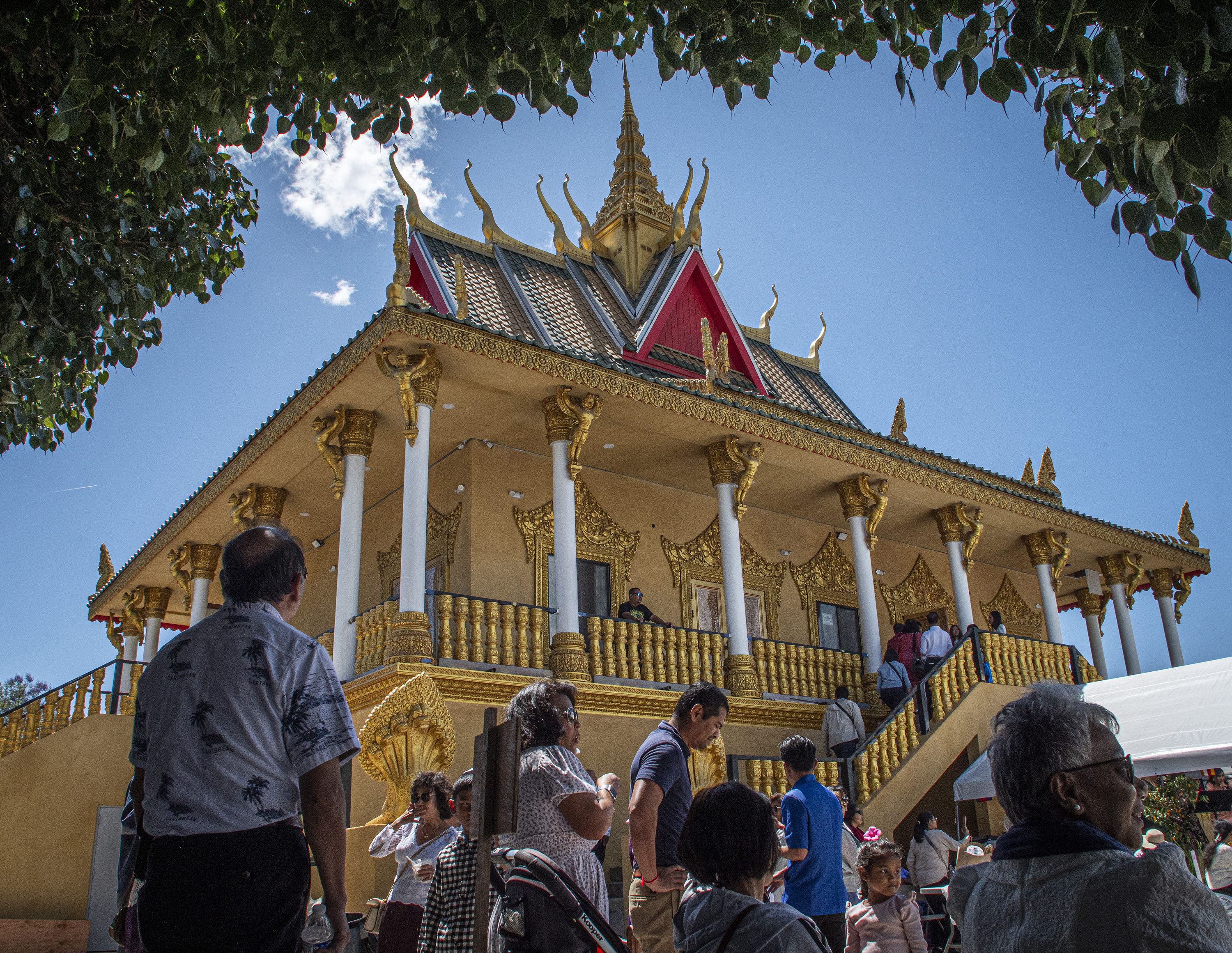 Attendees visit the new temple (still under construction) during the...