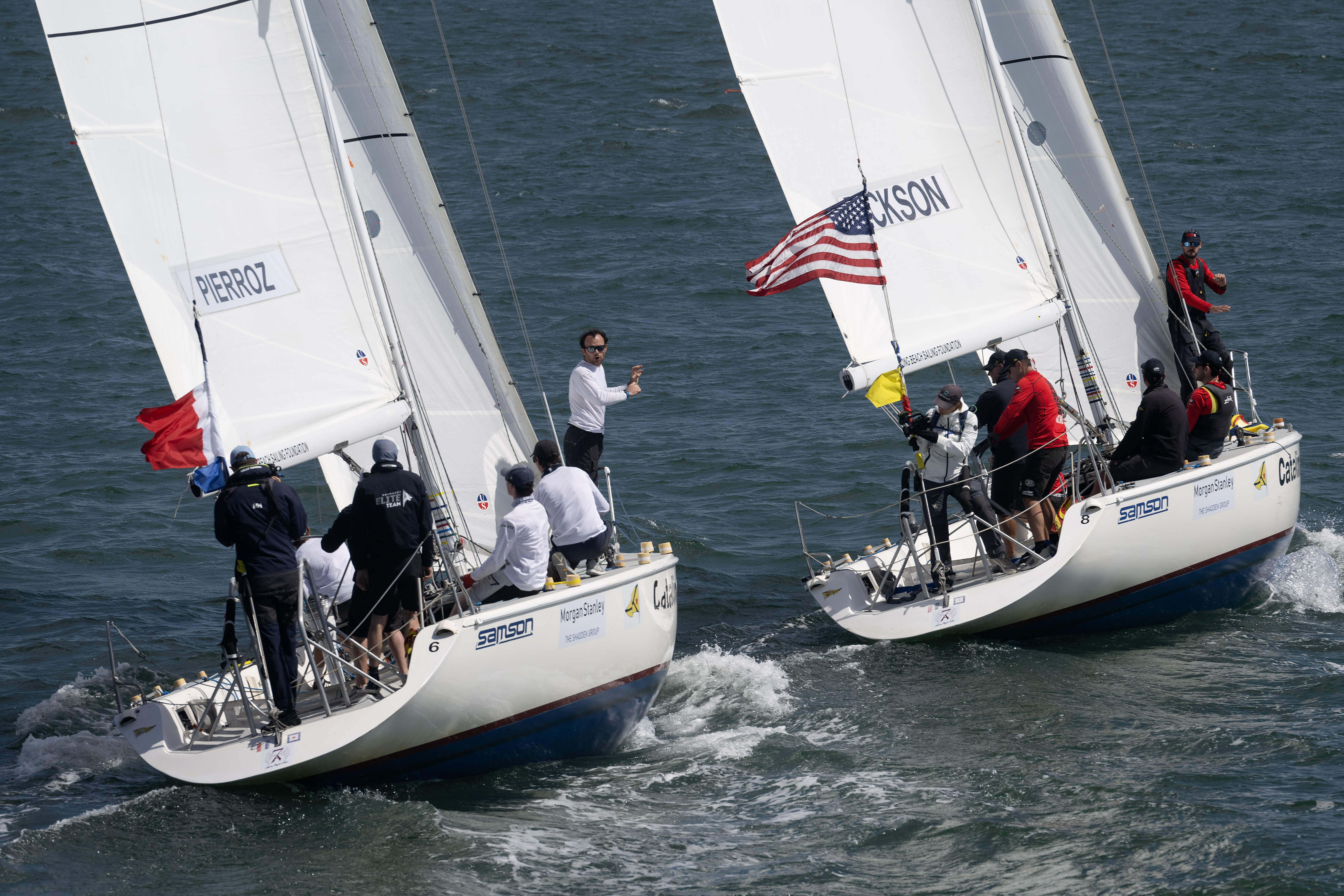 From left, Franceâs Aurelien Pierroz and USAâs Scotty Dickson compete...