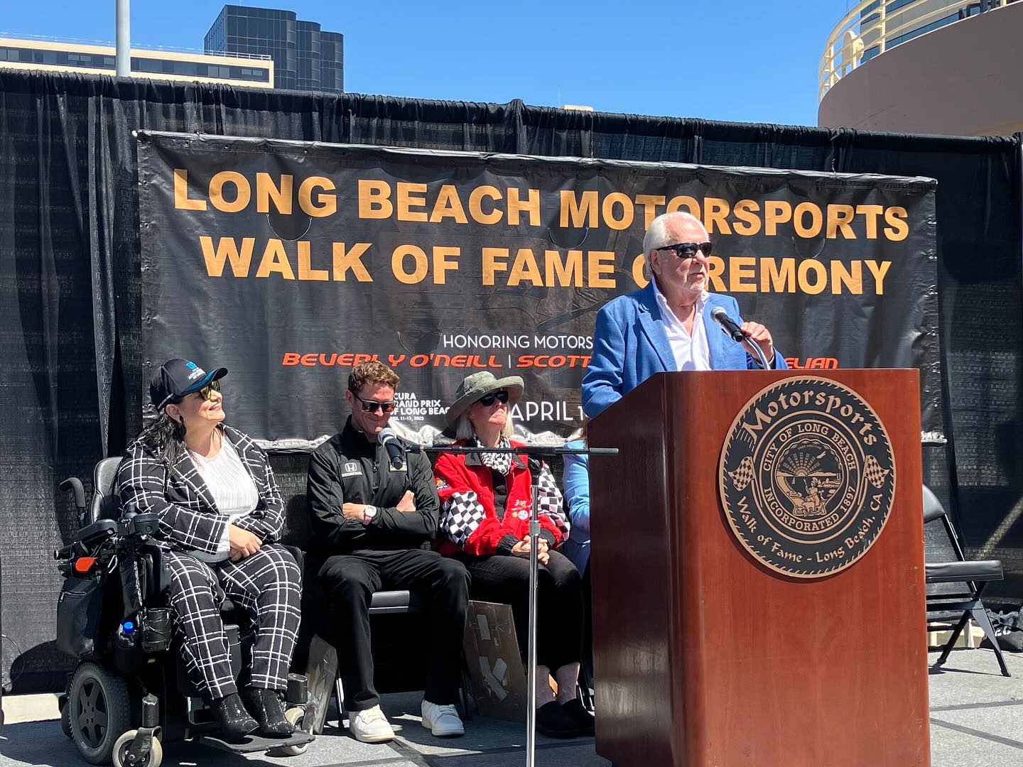 Long Beach Councilmember Mary Zendejas, left, listens to Grand Prix...