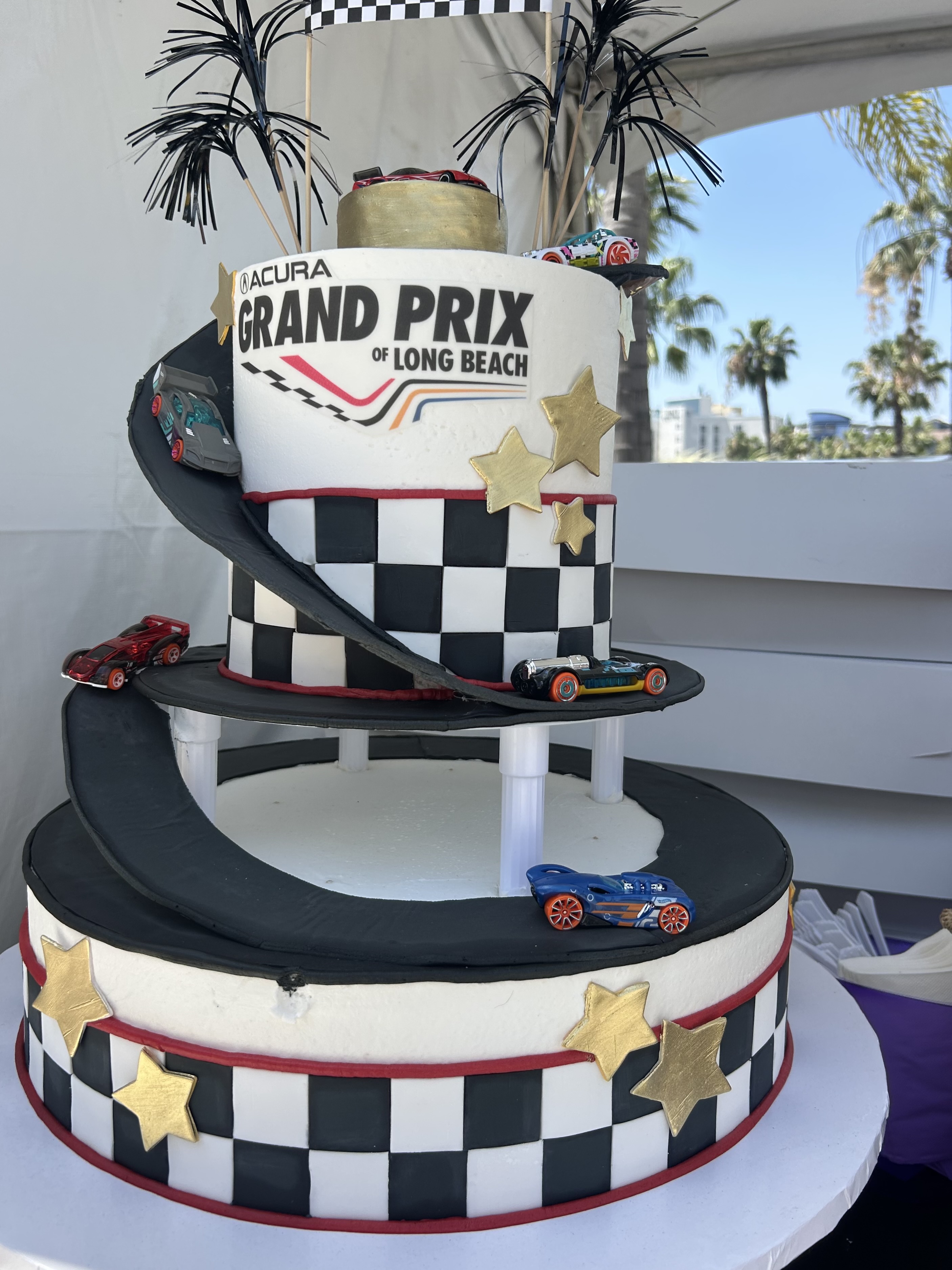 A custom cake that Butter and Cream Bakery has on...